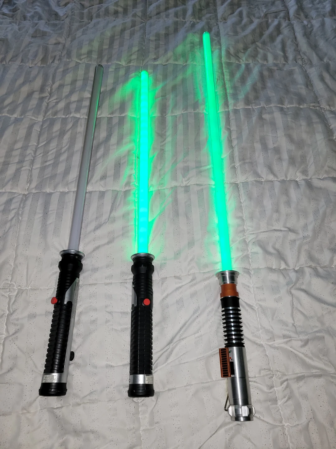 Three Star Wars Lightsaber Toys