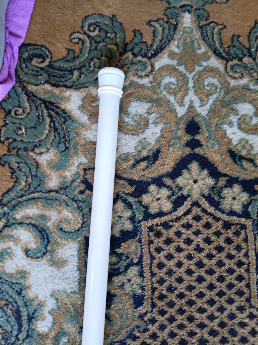 Adjustable tension rod