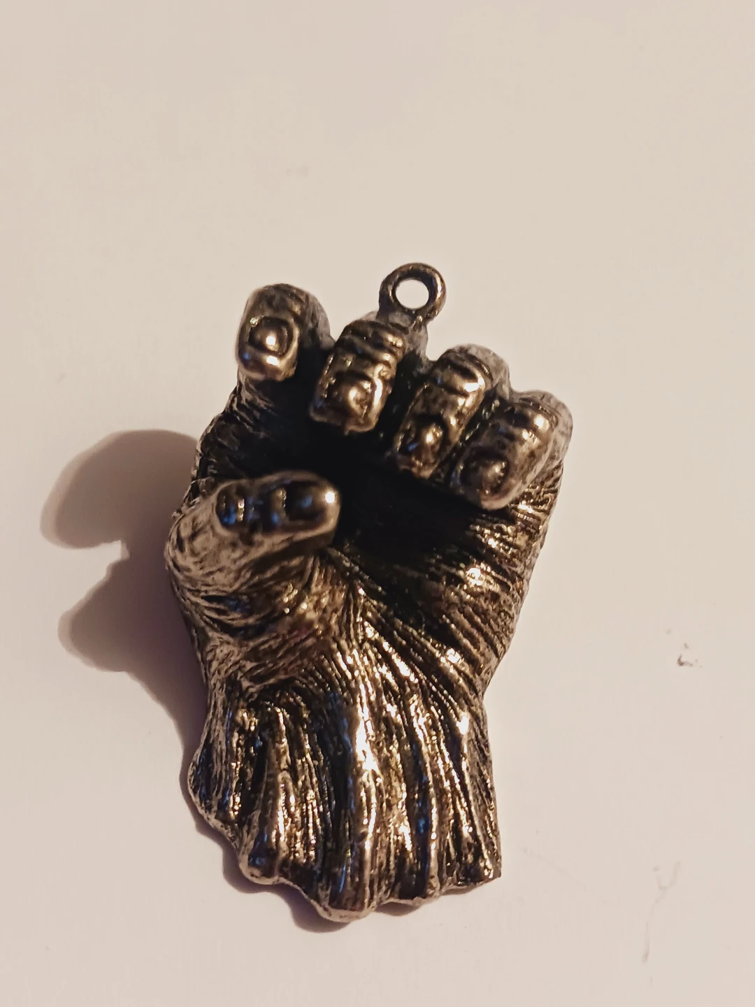 Beautiful detailed metallic silver tone fist pendant - photo 2