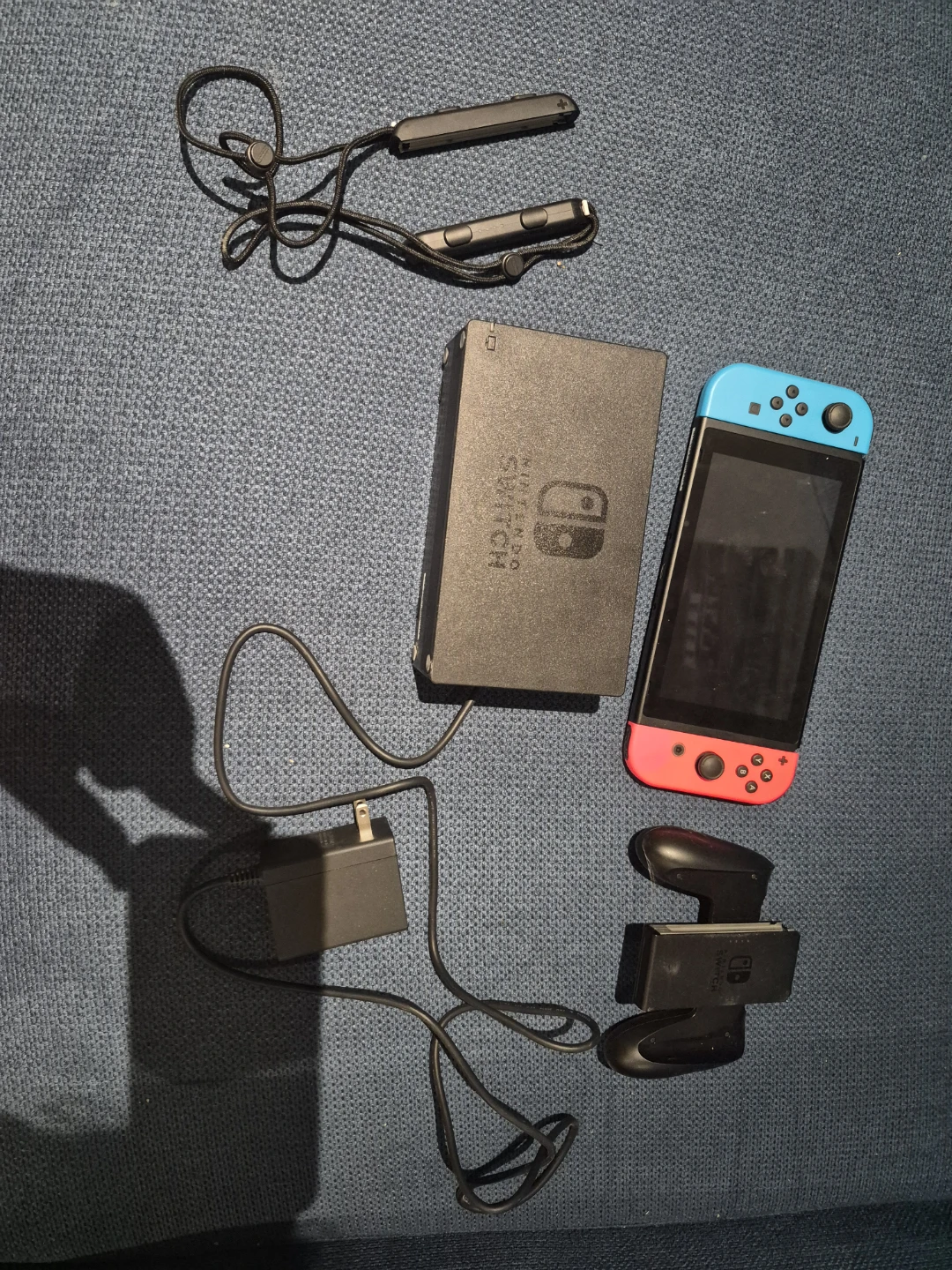 Nintendo Switch Console with Neon Red and Blue Joy-Cons