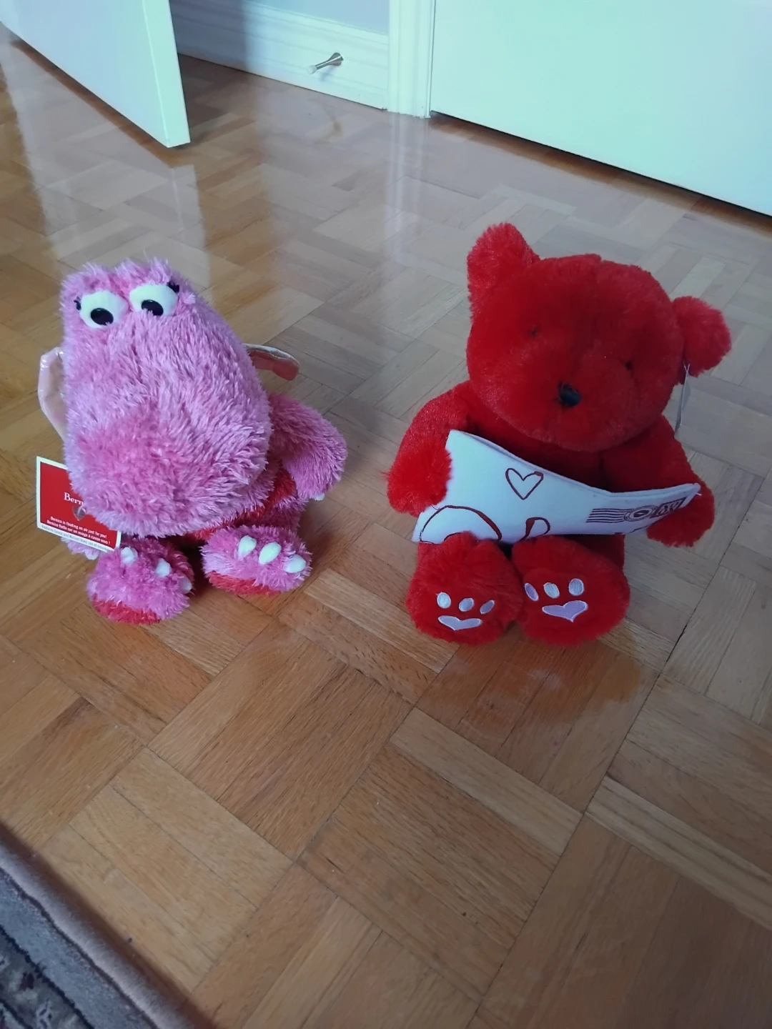 Two singing Hallmark Plush Toys
