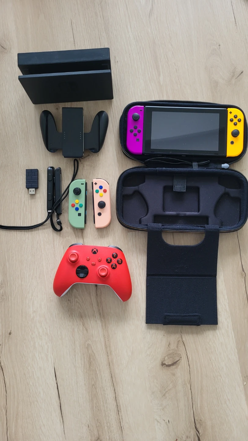 Nintendo Switch Console with Accessories and Xbox Controller