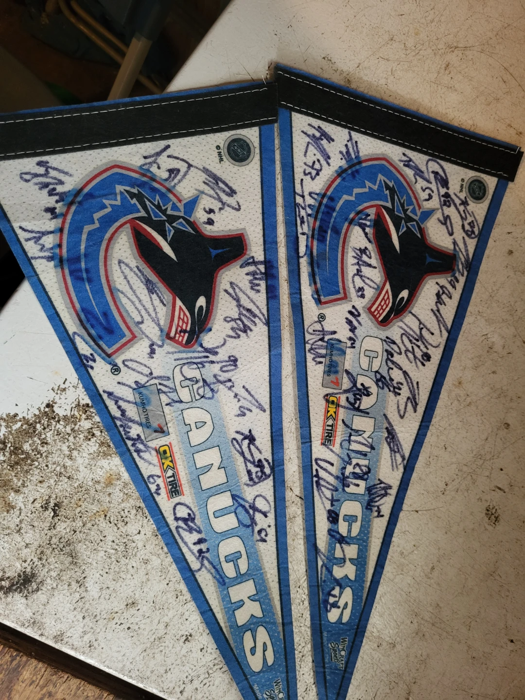 Two Autographed Vancouver Canucks Pennants