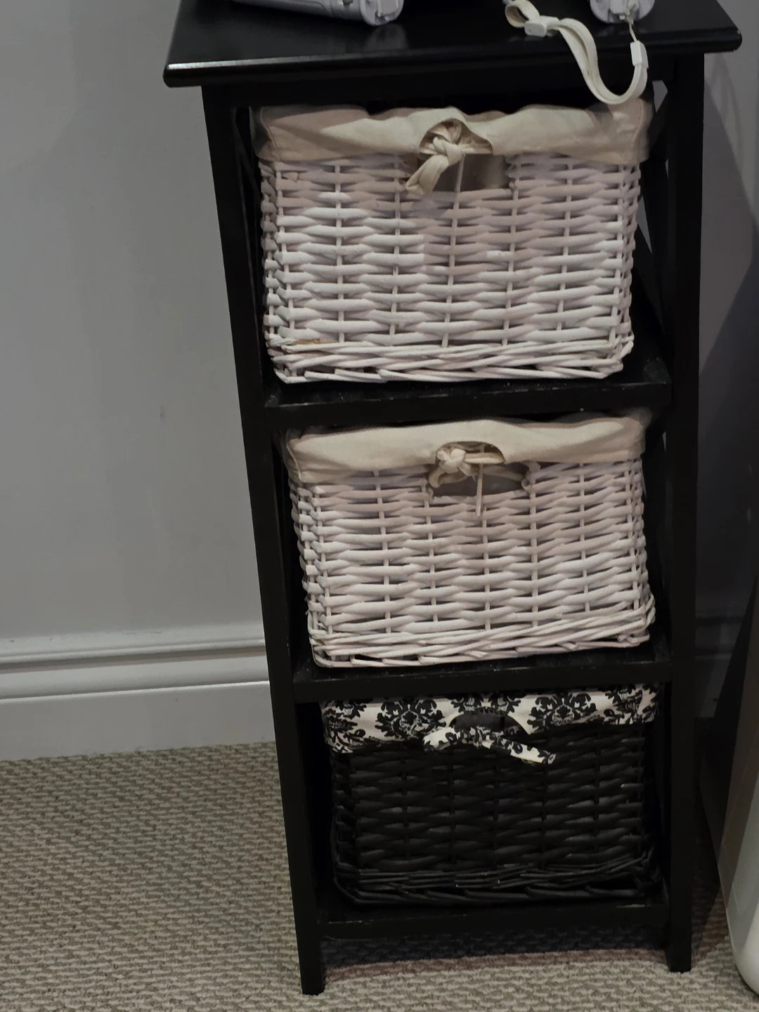 Black Three-Tier Storage Shelf with Baskets