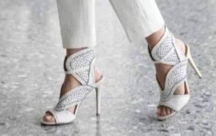Nine West  white Laser-Cut Stiletto Heels