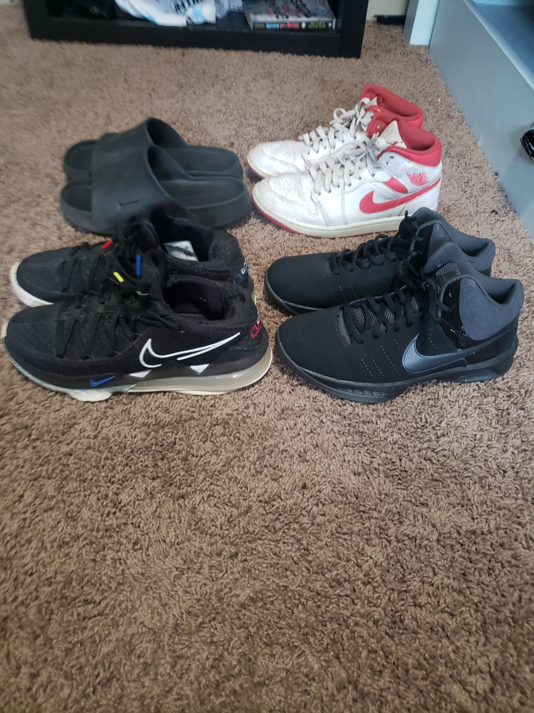 Selection of Nike shoes and slides