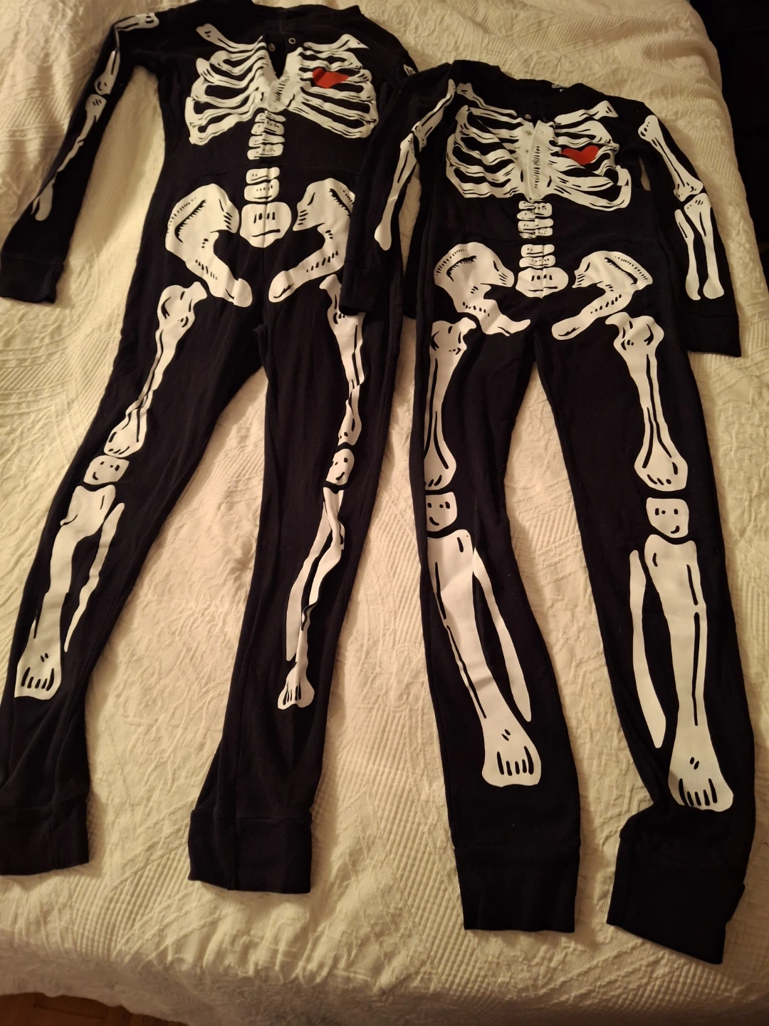 Two Skeleton Pattern Onesies
