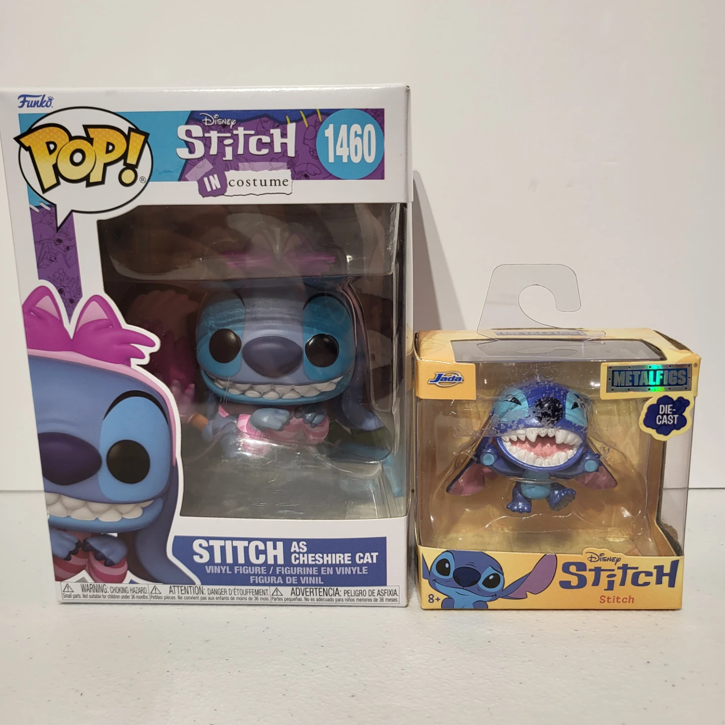 Funko Pop Stitch as Cheshire Cat and Jada Metalfigs