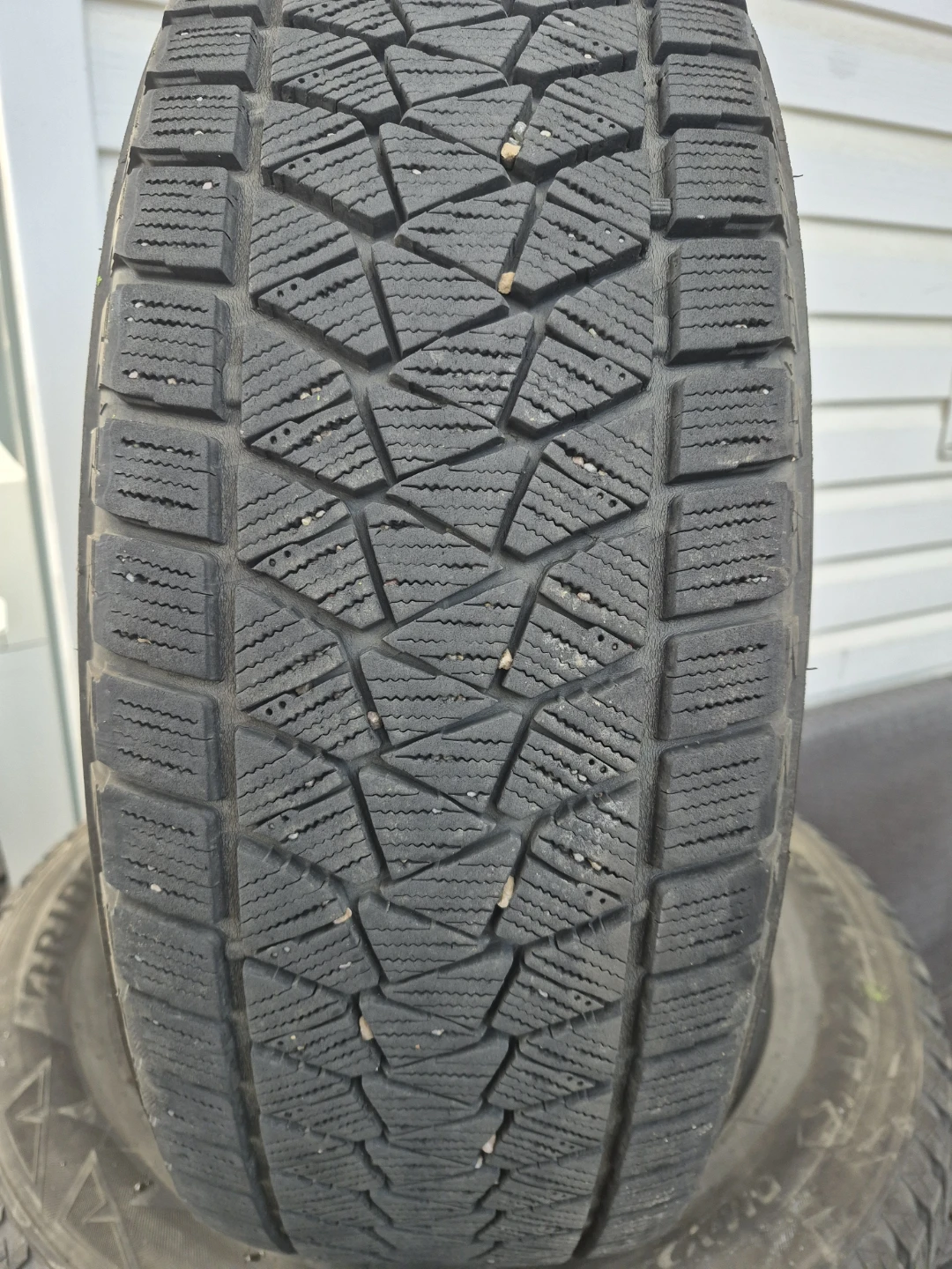 Two Bridgestone 225/65R17 102S Winter Tires