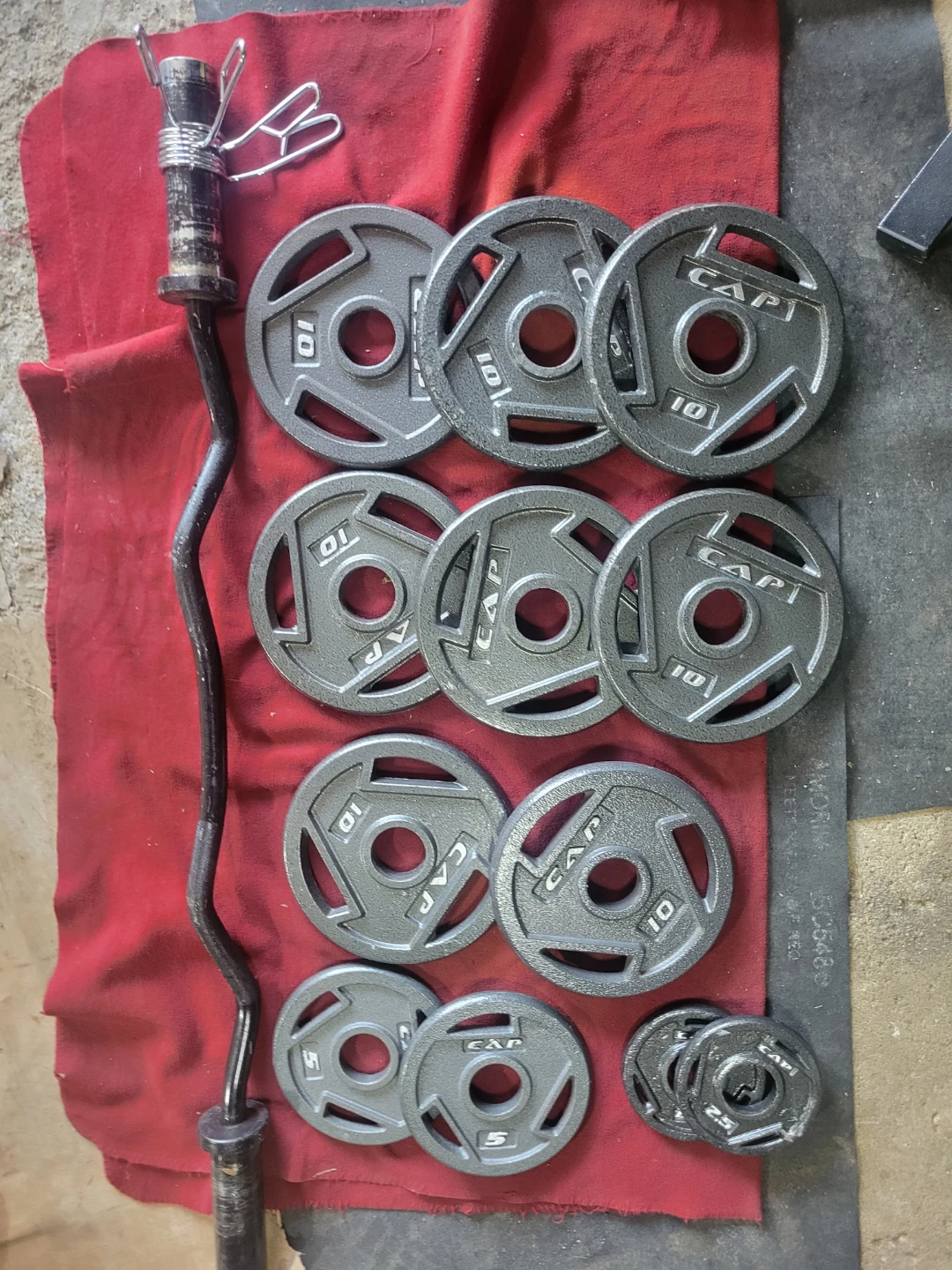 2" HOLE EZ-CURL BAR WITH 95LBSs OLYMPIC PLATES