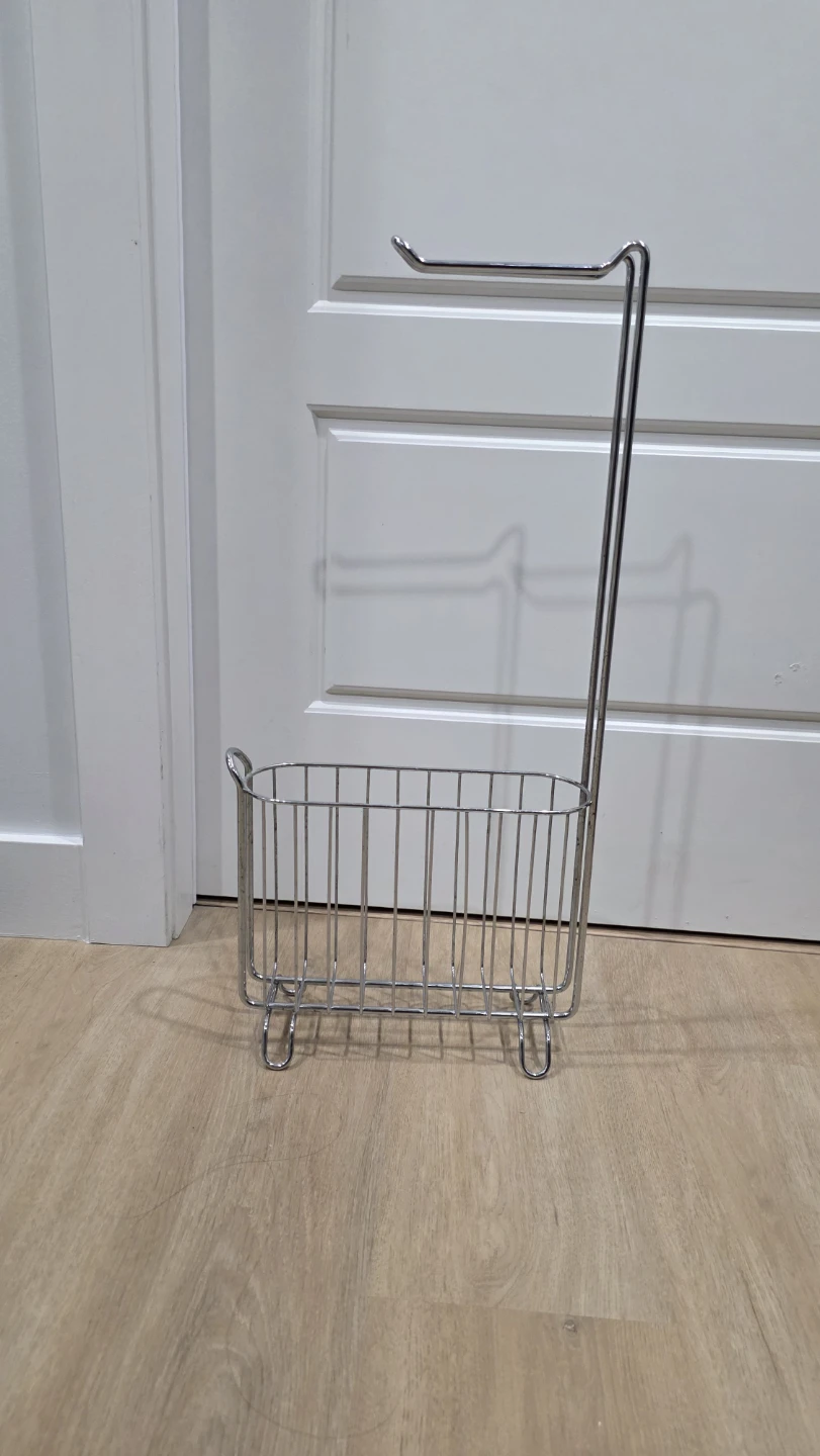 Chrome toilet paper roll holder with magazine basket