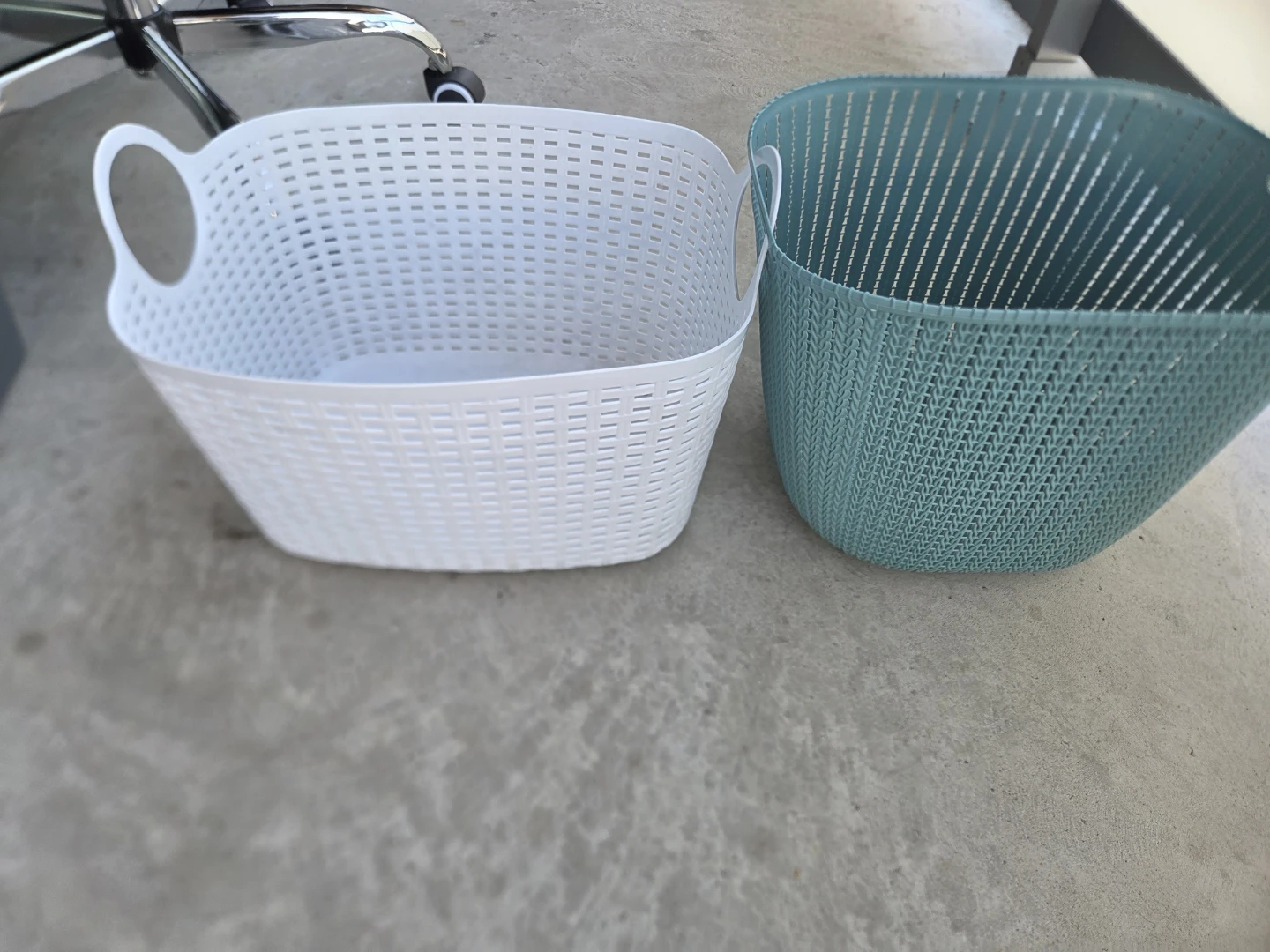 Two Woven Plastic Storage Baskets
