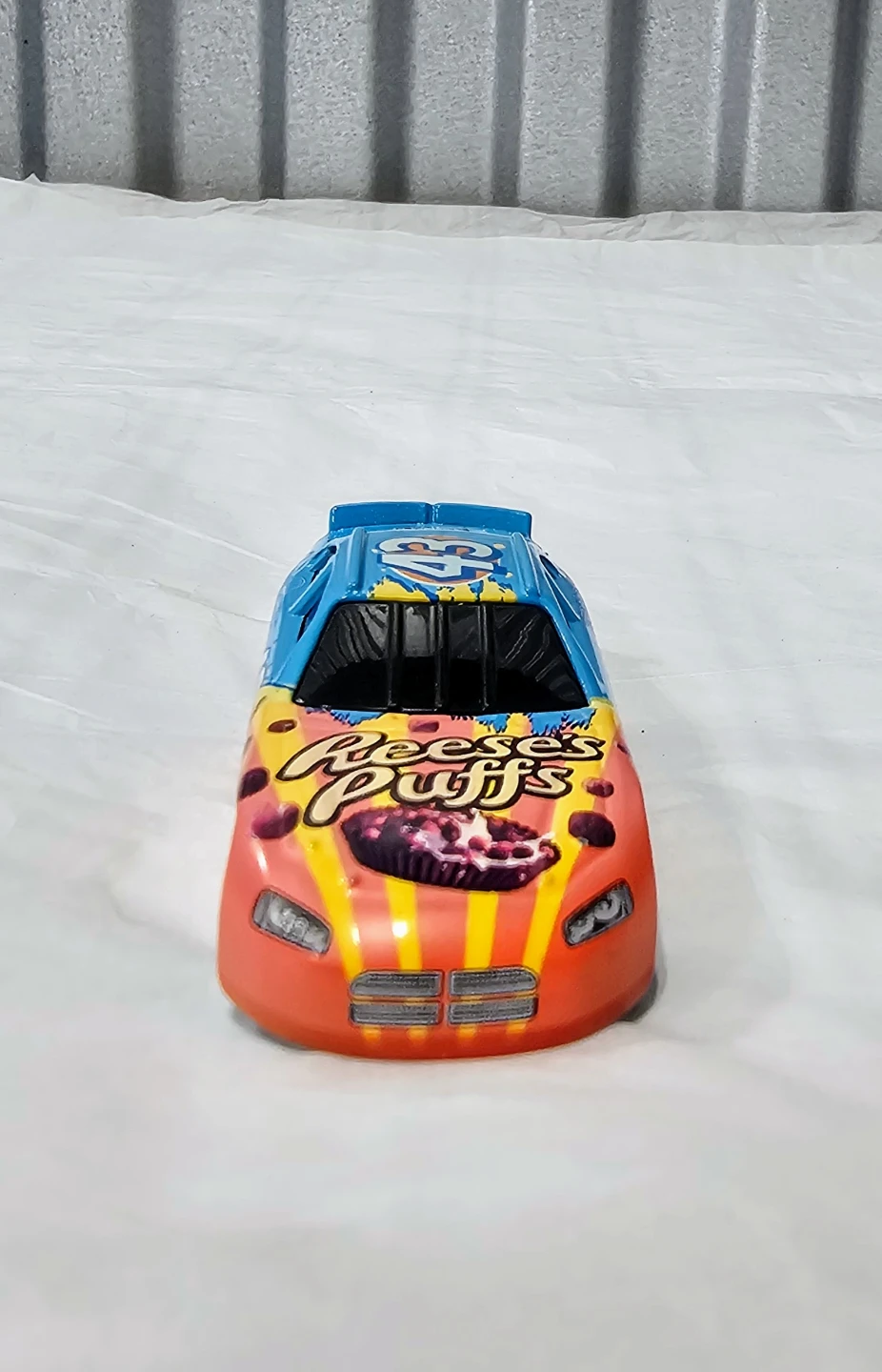 1:64 NASCAR #43 2008 Chevy Monte Carlo Reese's Puffs Diecast - photo 3
