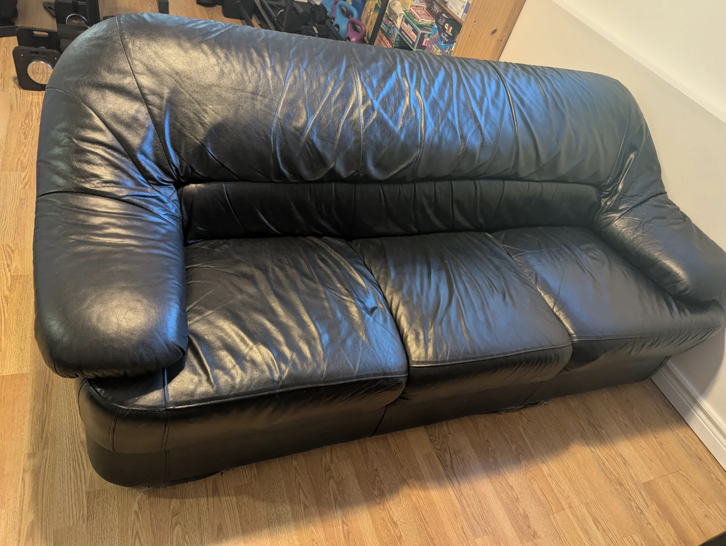 Black Leather Three-Seater Sofa
