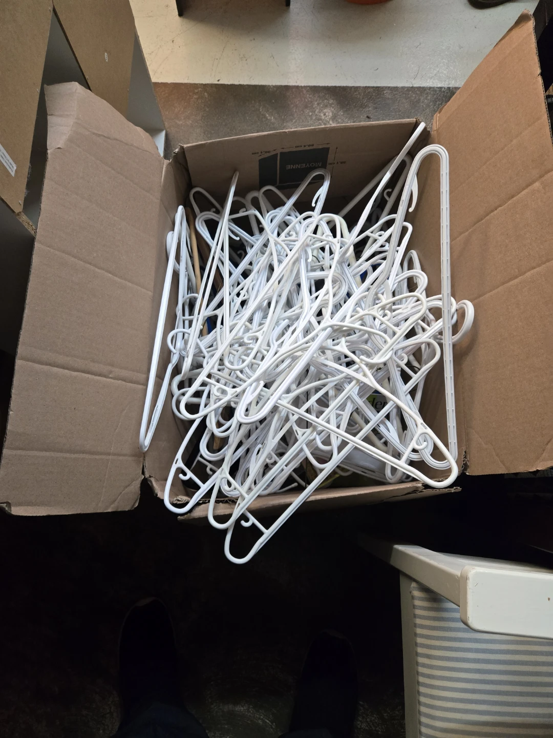 Box of Assorted White Plastic Hangers