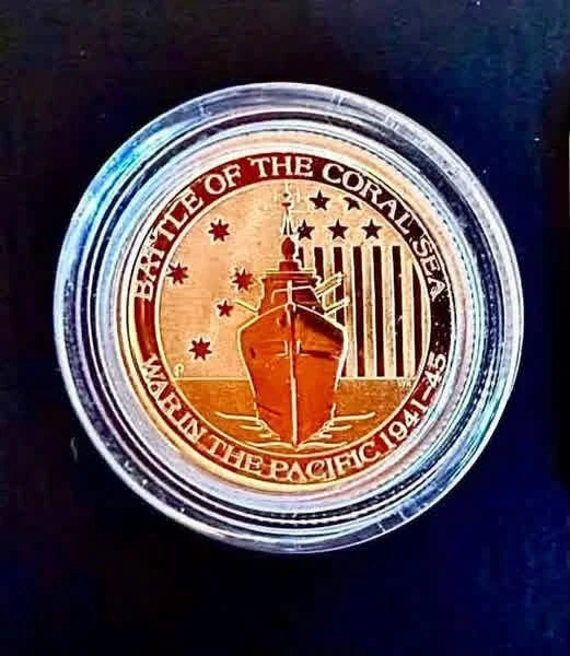 “Battle of the Coral Sea” 1/10 pure 9999 gold coin in capsule.