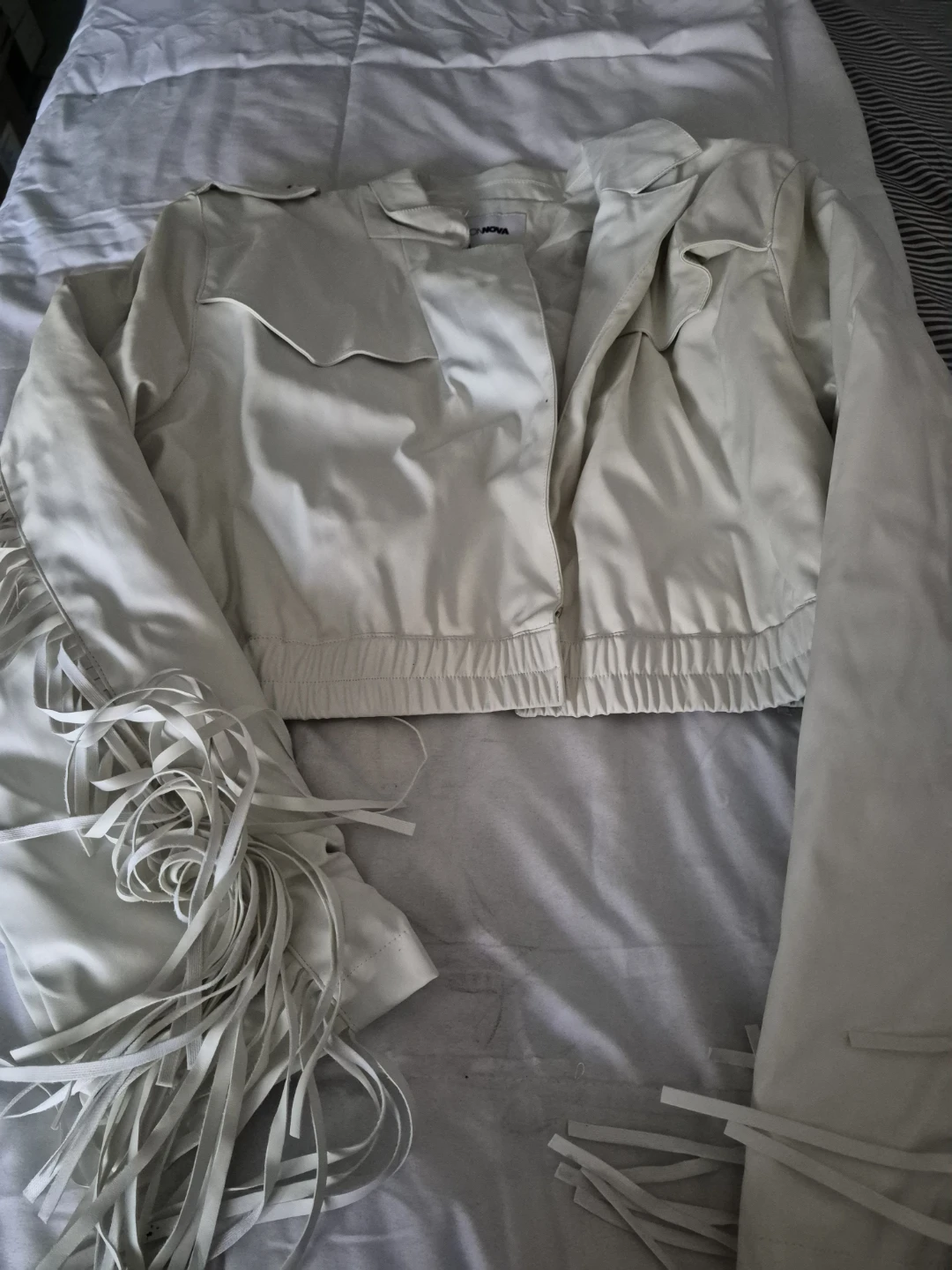 Fashion Nova Cream Fringe Faux Leather Jacket