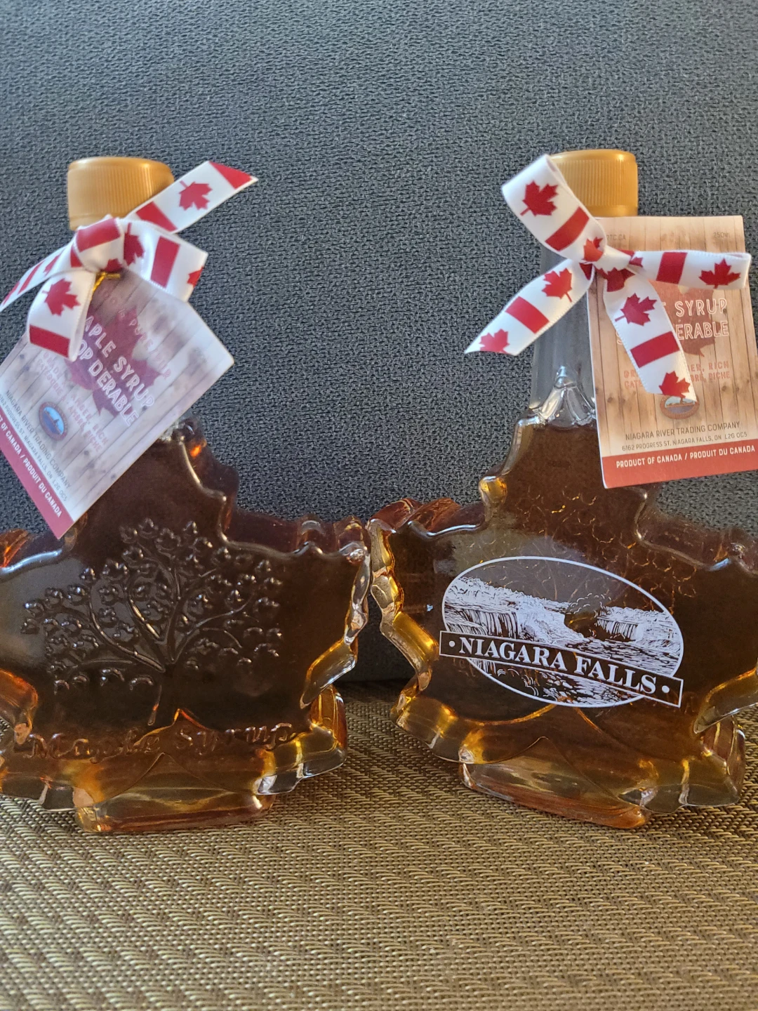 Two Niagara Falls Maple Syrup Bottles