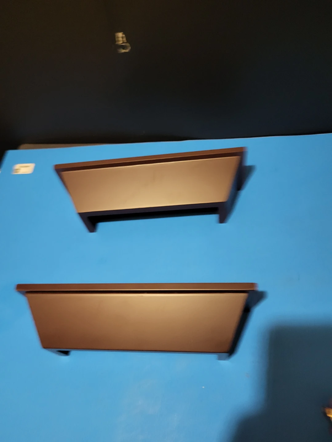 Two Brown Wall-Mounted Shelves