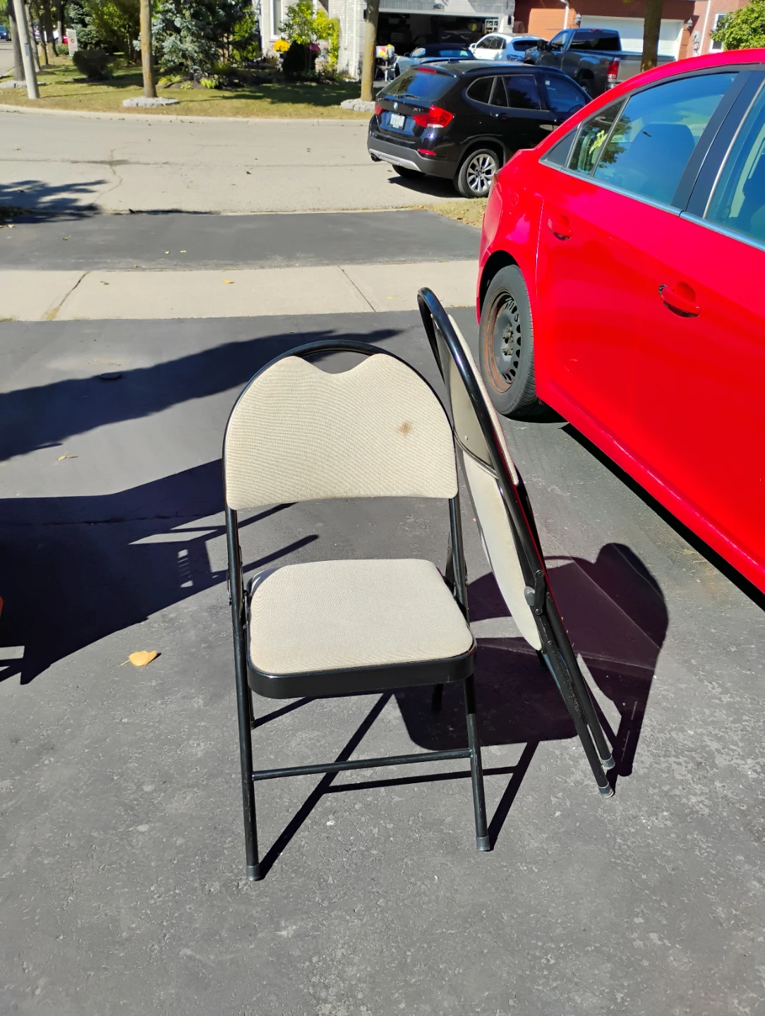 2 Black Folding Chairs with Beige Fabric Seats - photo 4