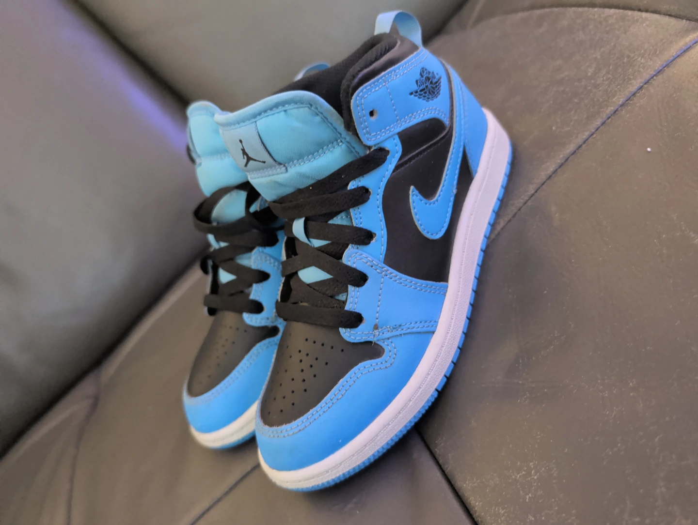 Air Jordan 1 Mid Blue and Black Sneakers
