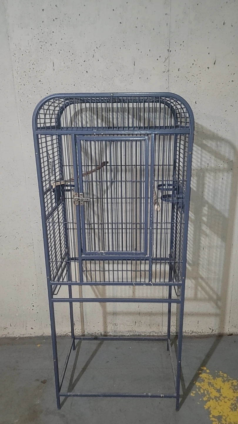Large grey metal bird cage with stand