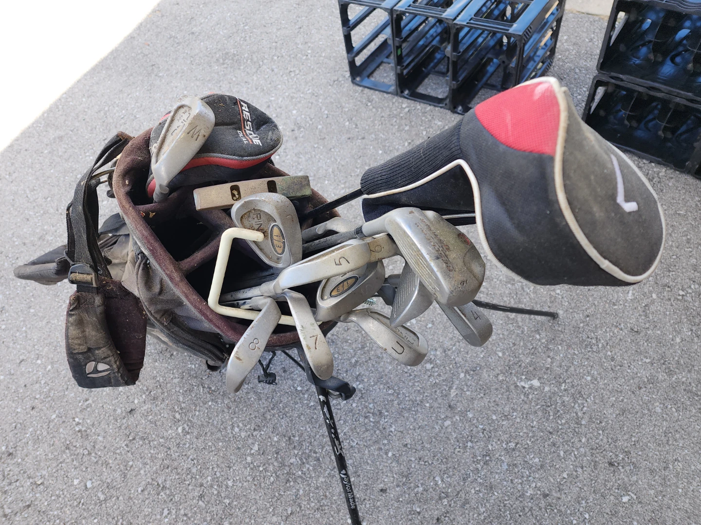 Right handed golf clubs and caddy
