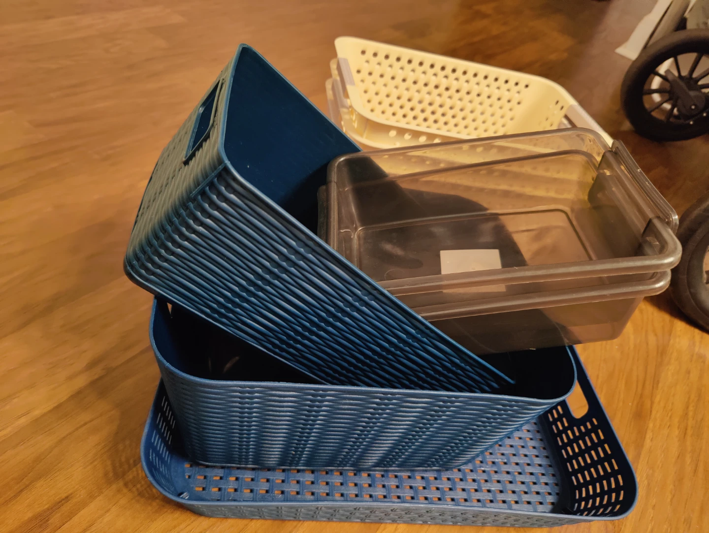 Set of assorted plastic storage bins