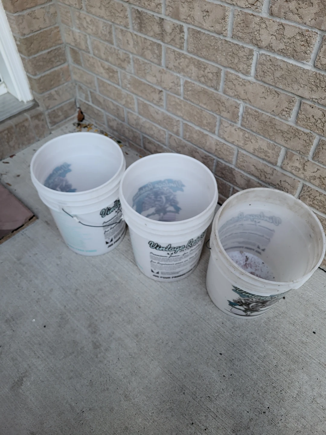 Three White Plastic Buckets