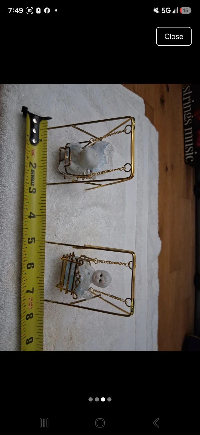 Pair of porcelain baby figurines on gold tone swings - photo 2