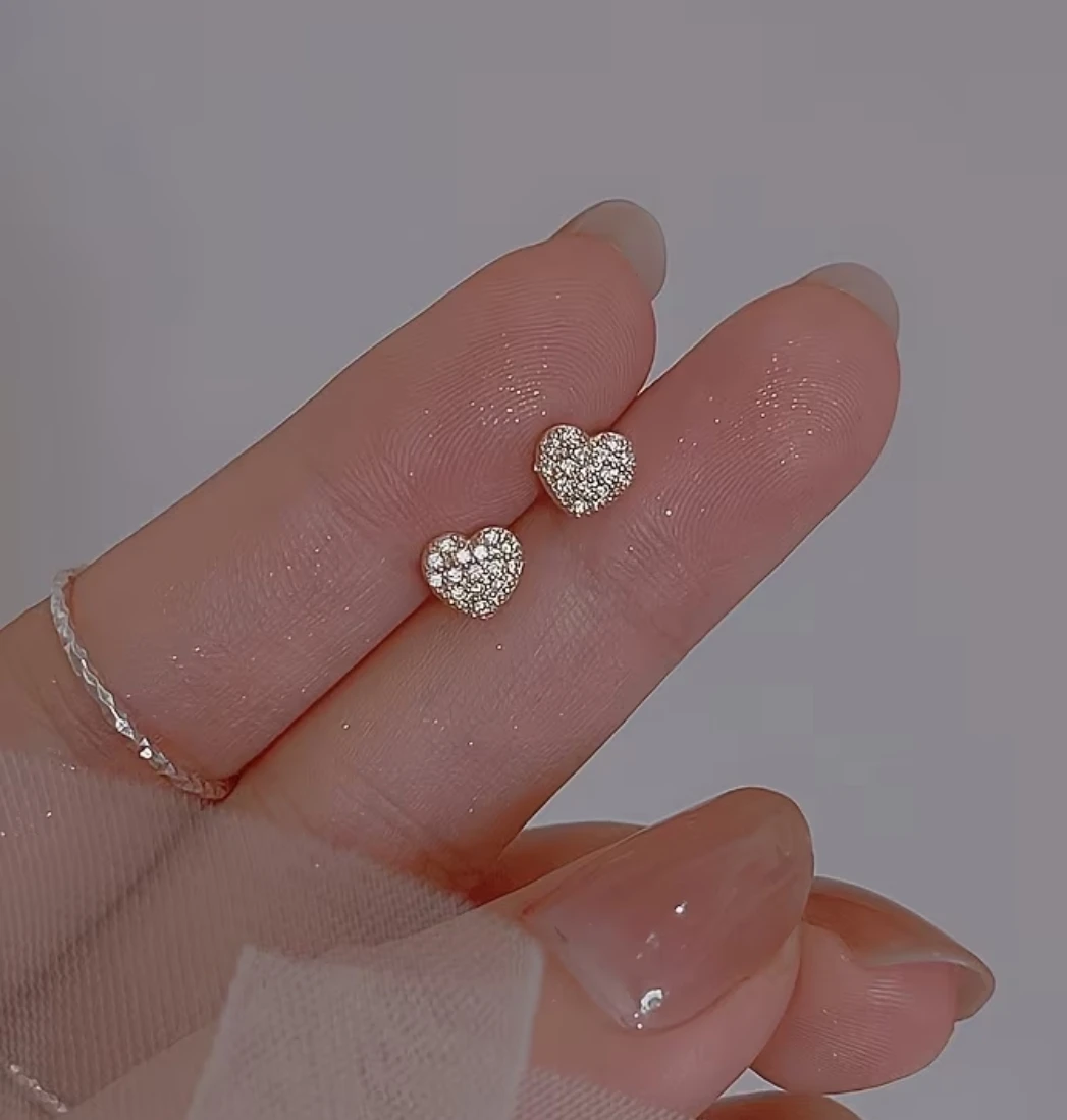 Gold-tone heart stud earrings with rhinestones