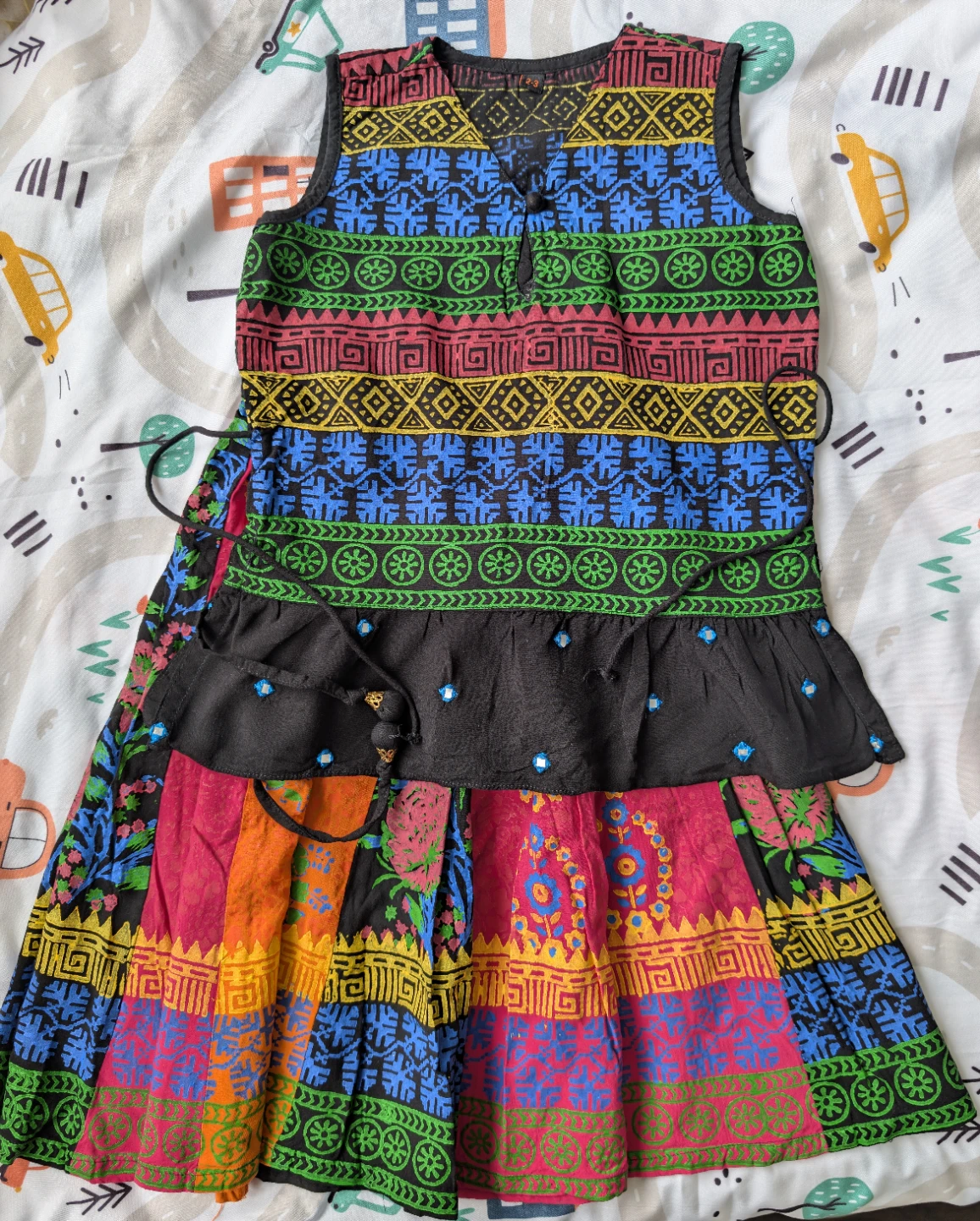 Girls colourful patterned dress