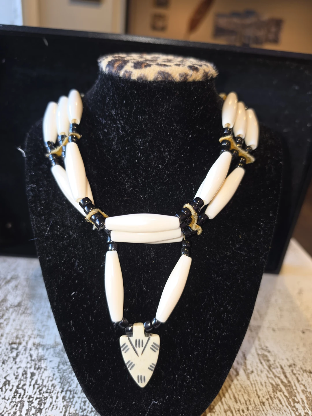 Indigenous-style bone bead choker necklace