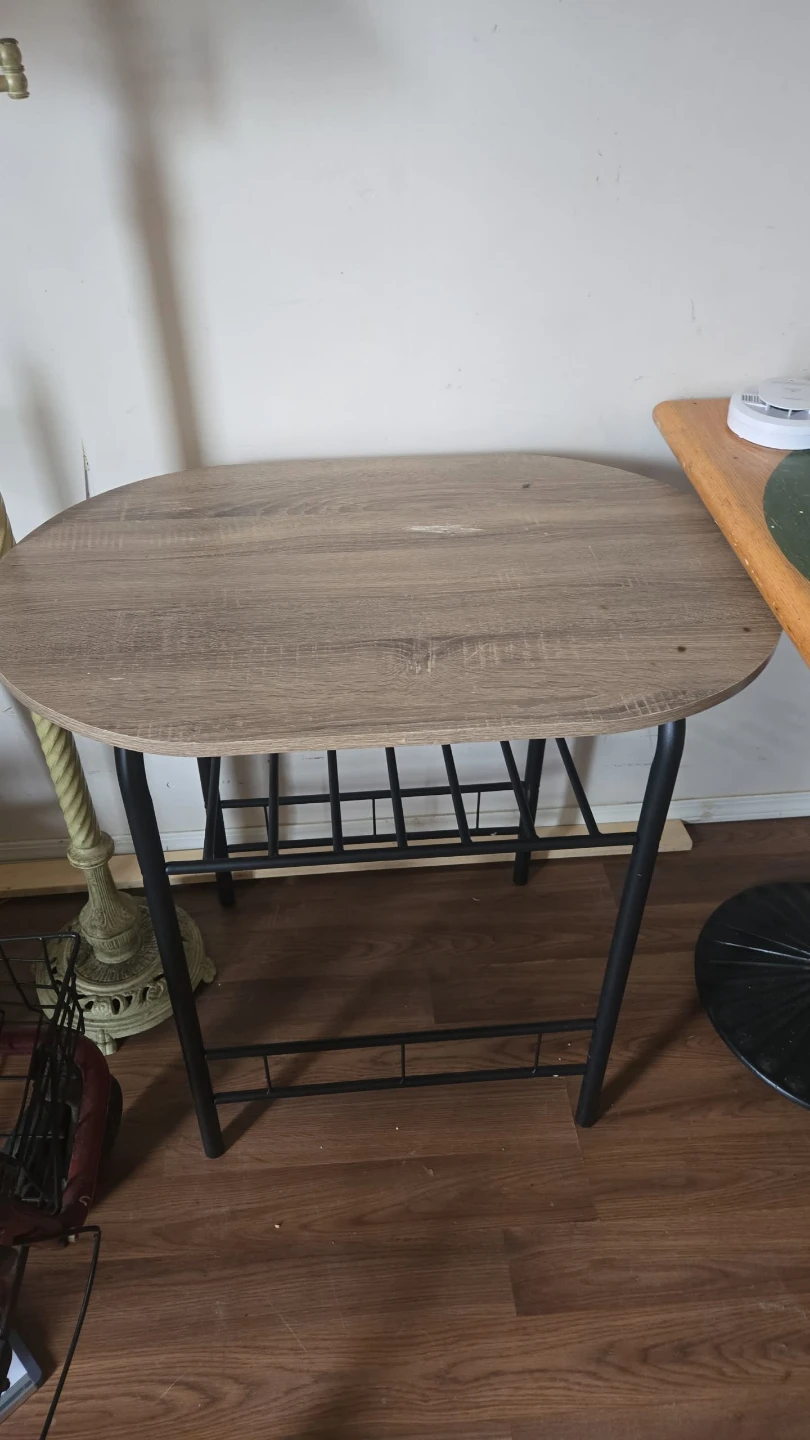 Small dining room table with rack underneath