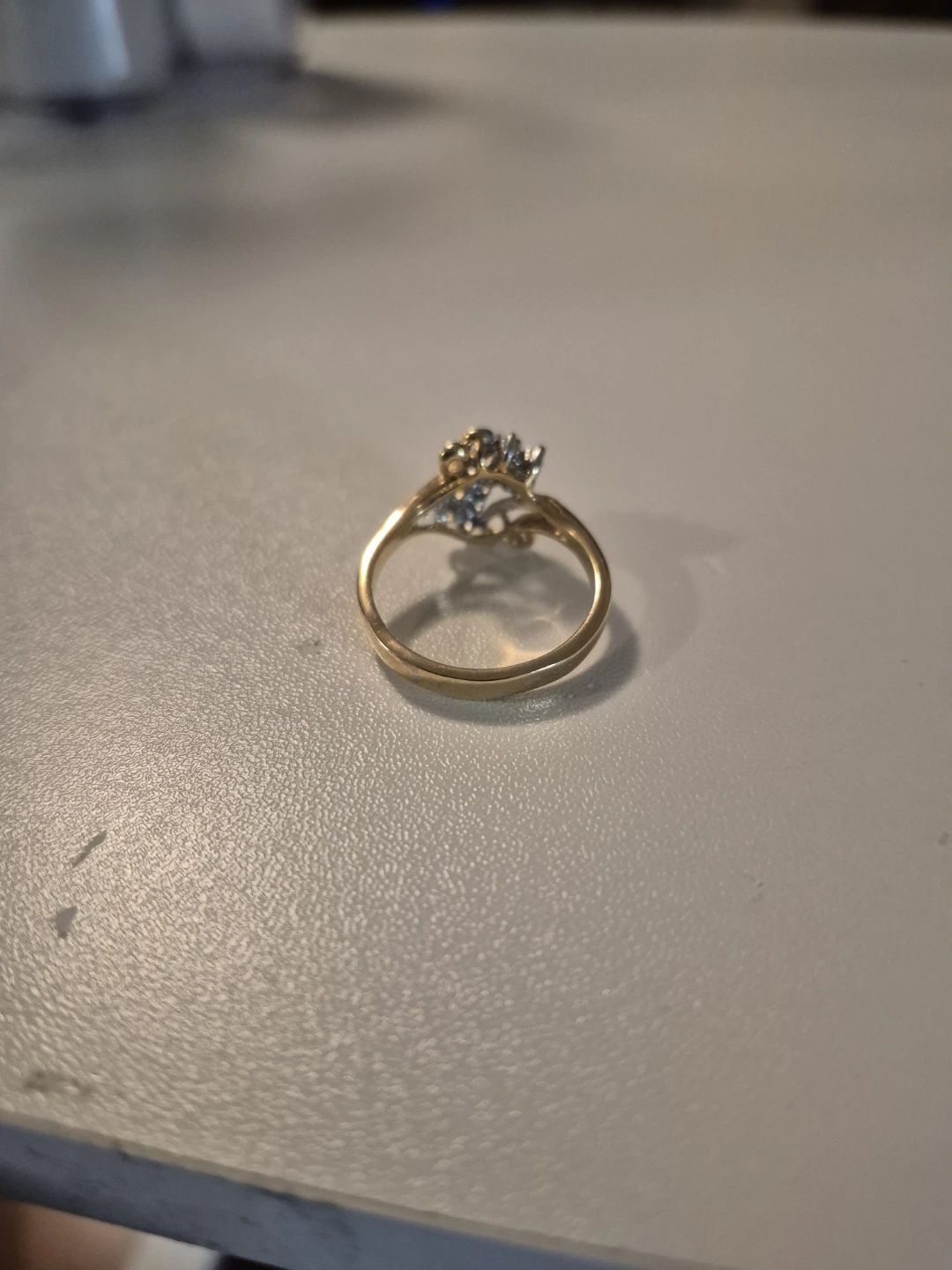Gold-tone ring with clear stones - photo 4