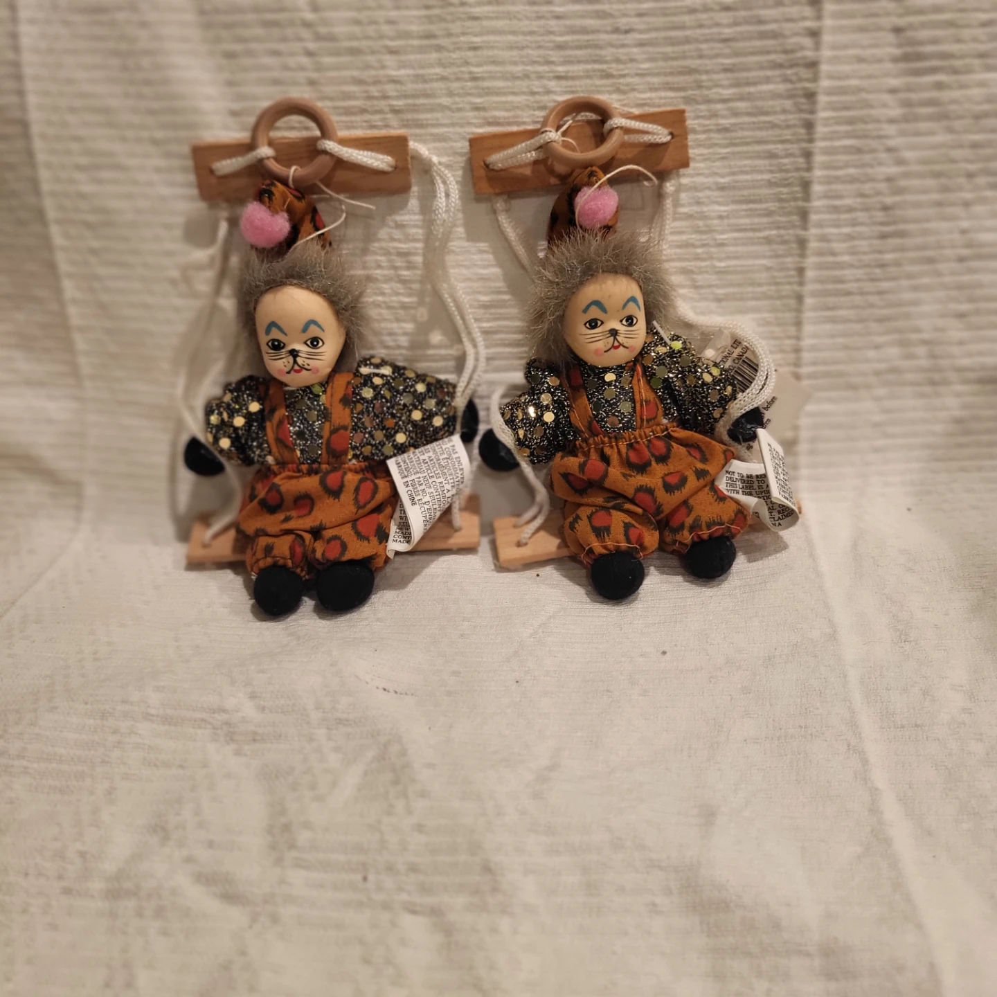 Two Vintage Clown Ornaments on Swings