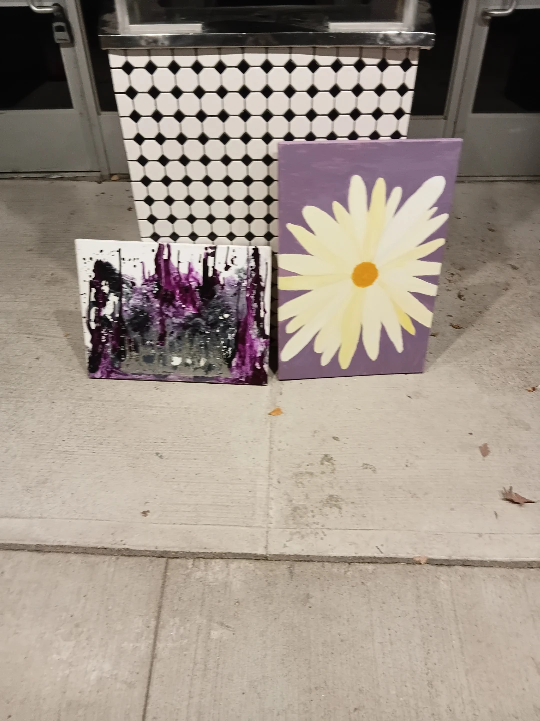 Two decorative canvas wall art pieces