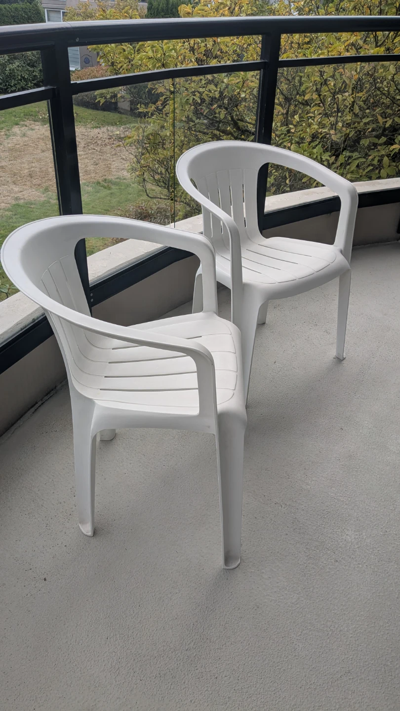 Two White Plastic Patio Chairs - photo 2