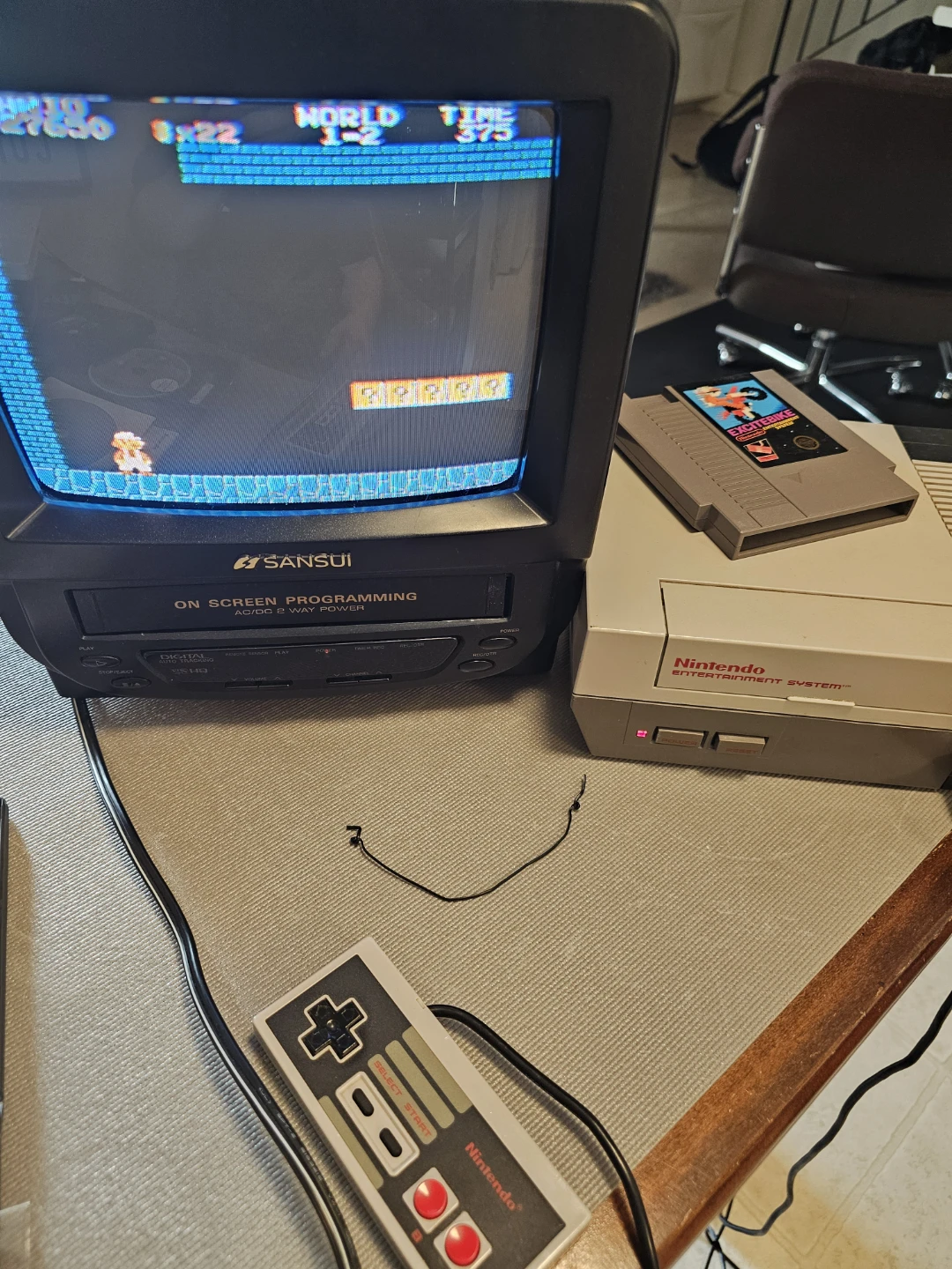 Nintendo Entertainment System with Sansui TV and Games