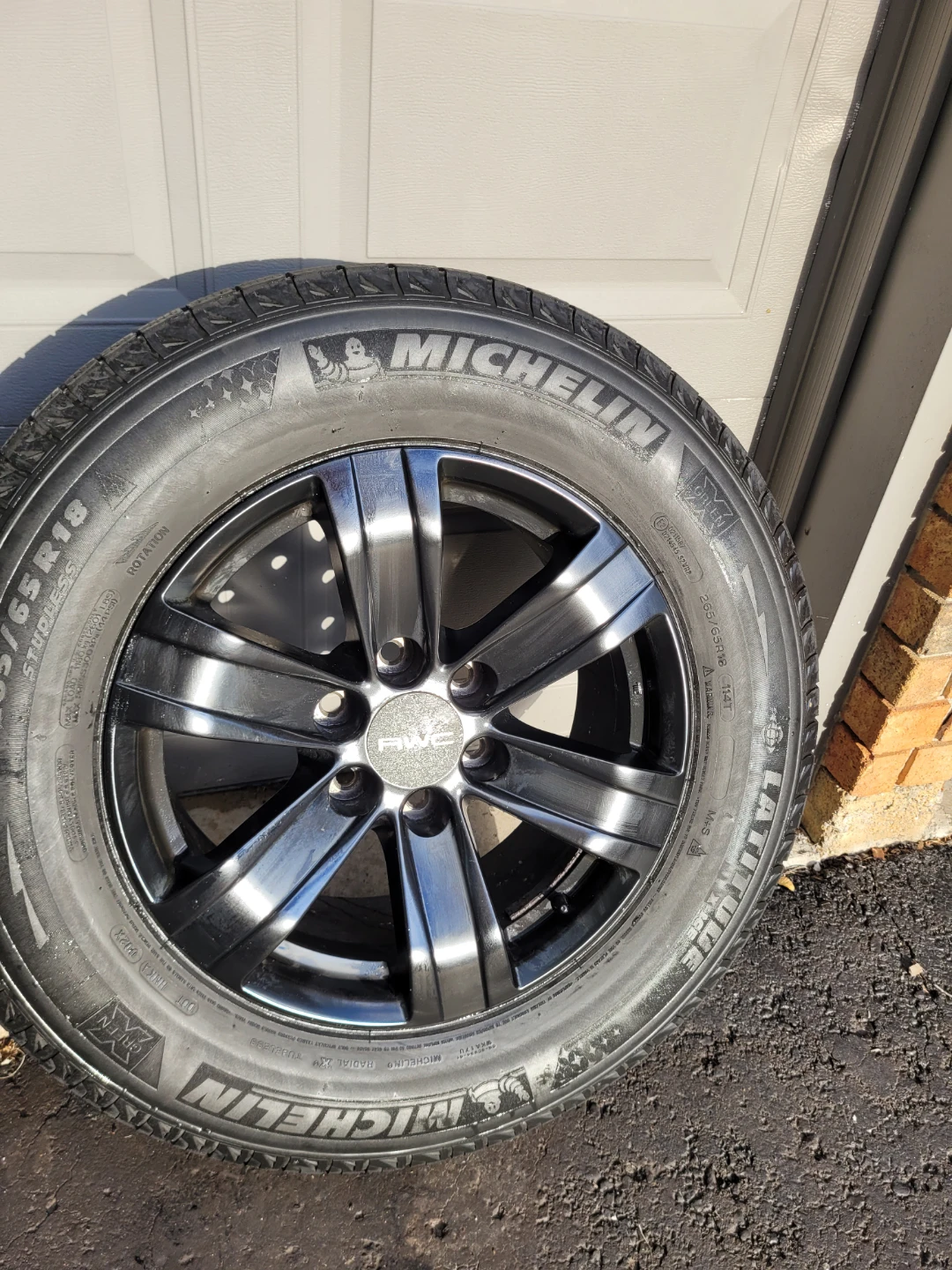 Winter tires mounted on black RWC rims 265/65R18
