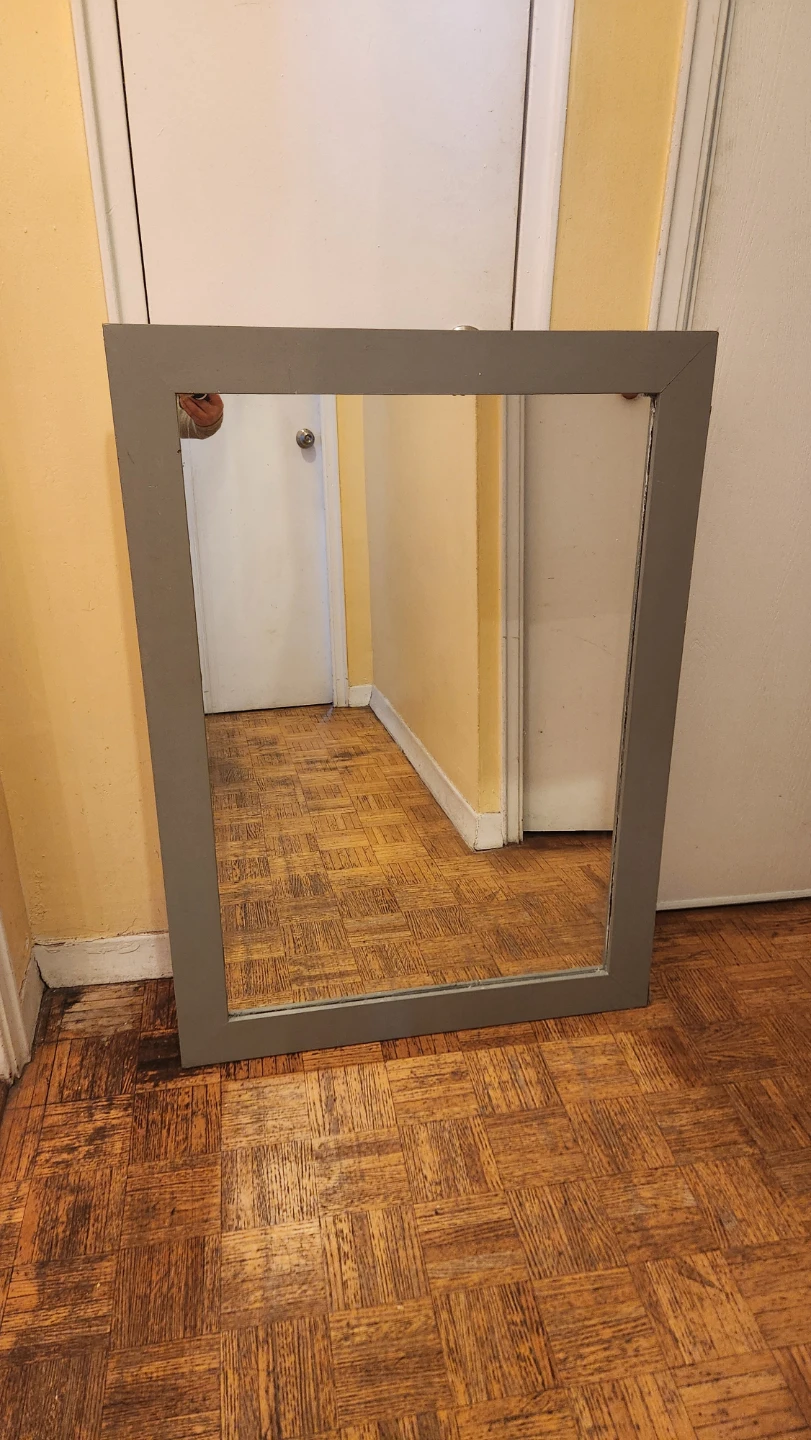 Large grey framed wall mirror