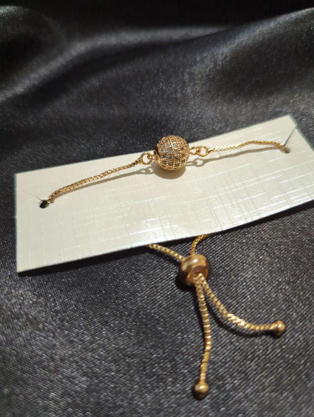 Gold-tone slider bracelet with crystal sphere - photo 2