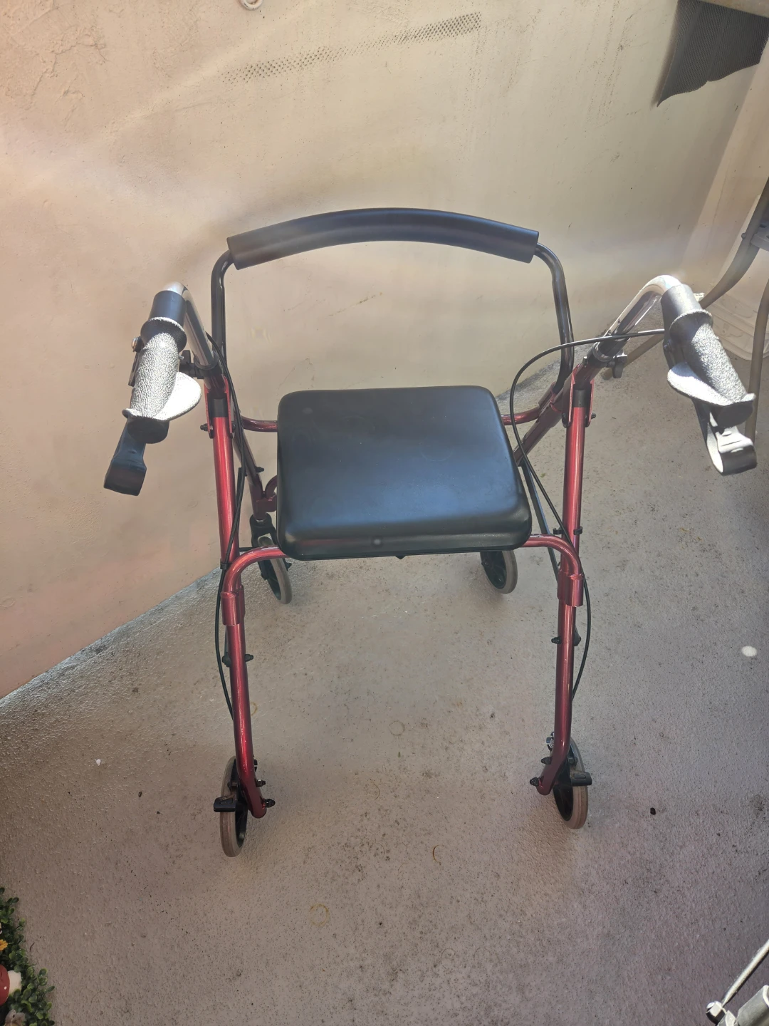 Red Four-Wheeled Mobility Walker