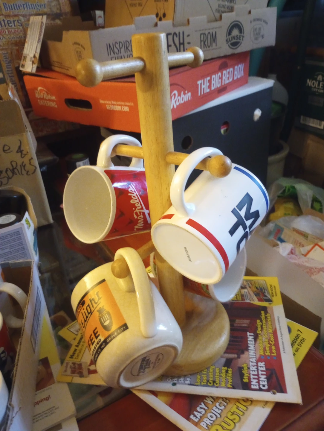 Wooden Coffee cup tree with a couple of coffee cups