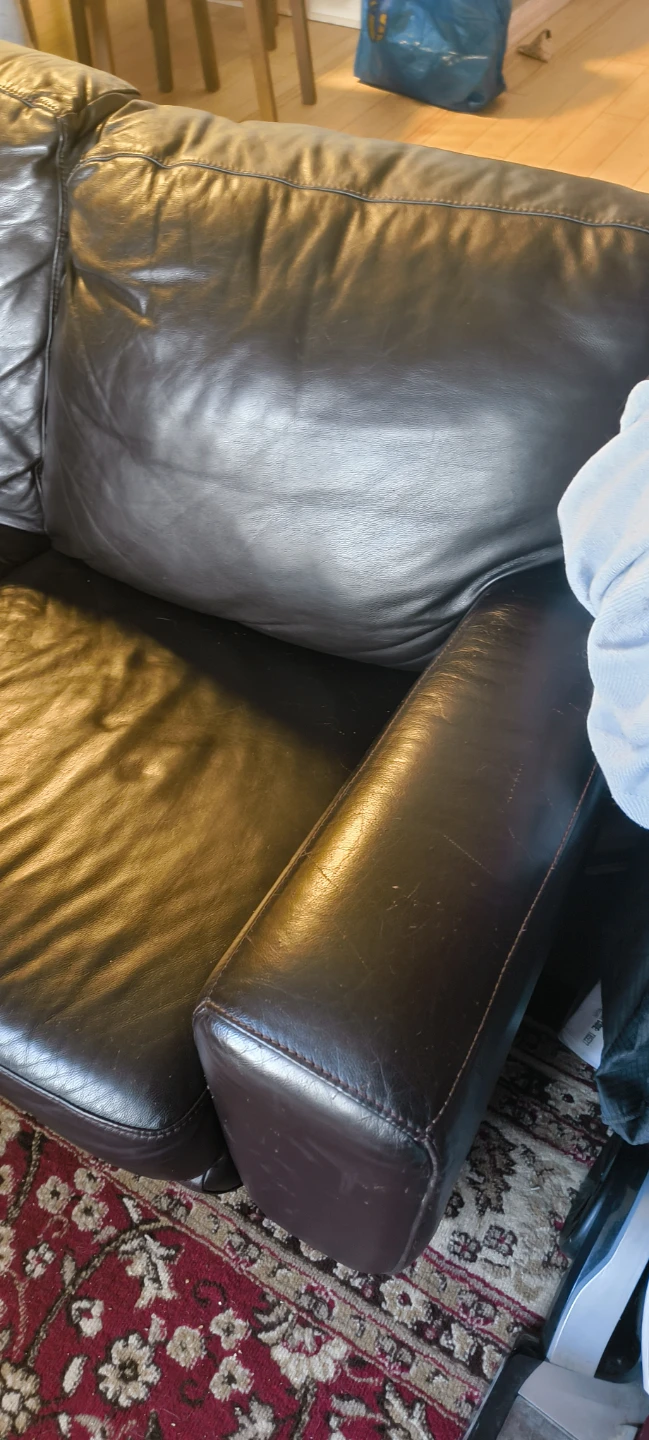 Dark brown leather sofa