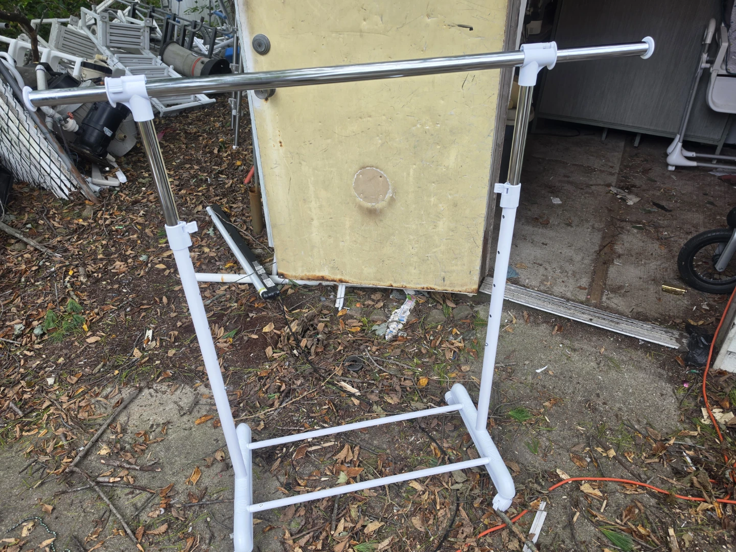 Adjustable garment rack.. the price is firm