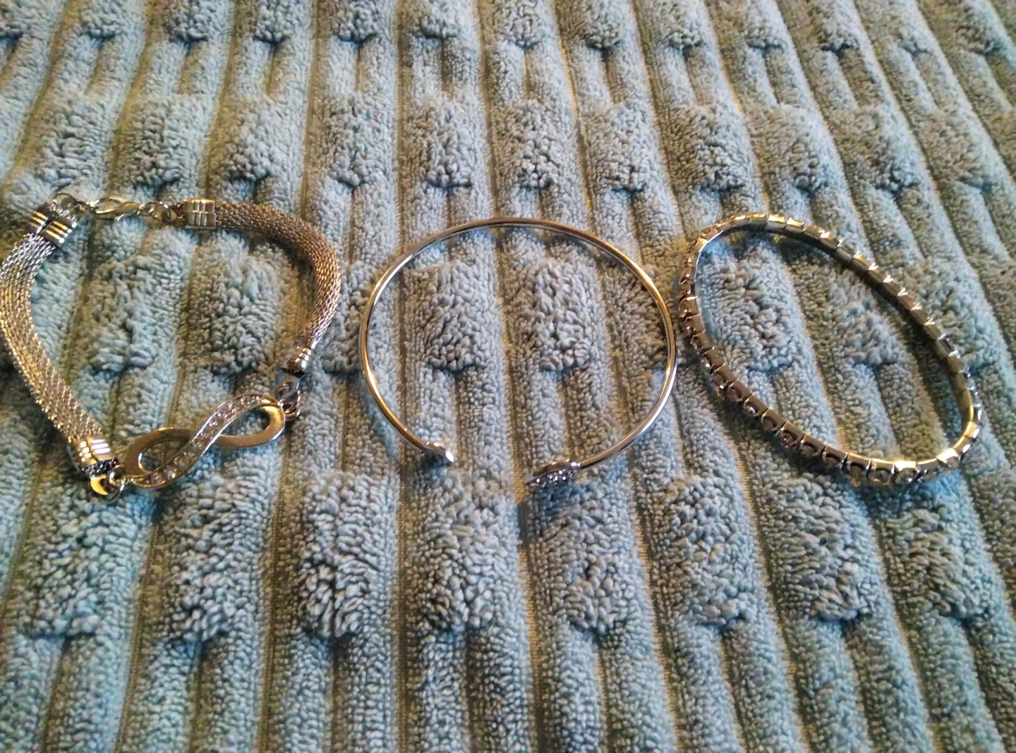 Set of three silver-tone bracelets