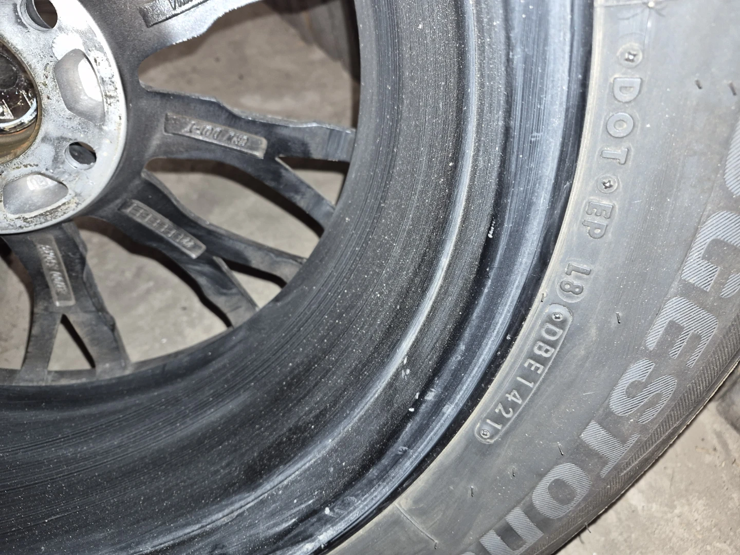 4 Bridgestone 235/65R17 Winter Tire and Rim - photo 4