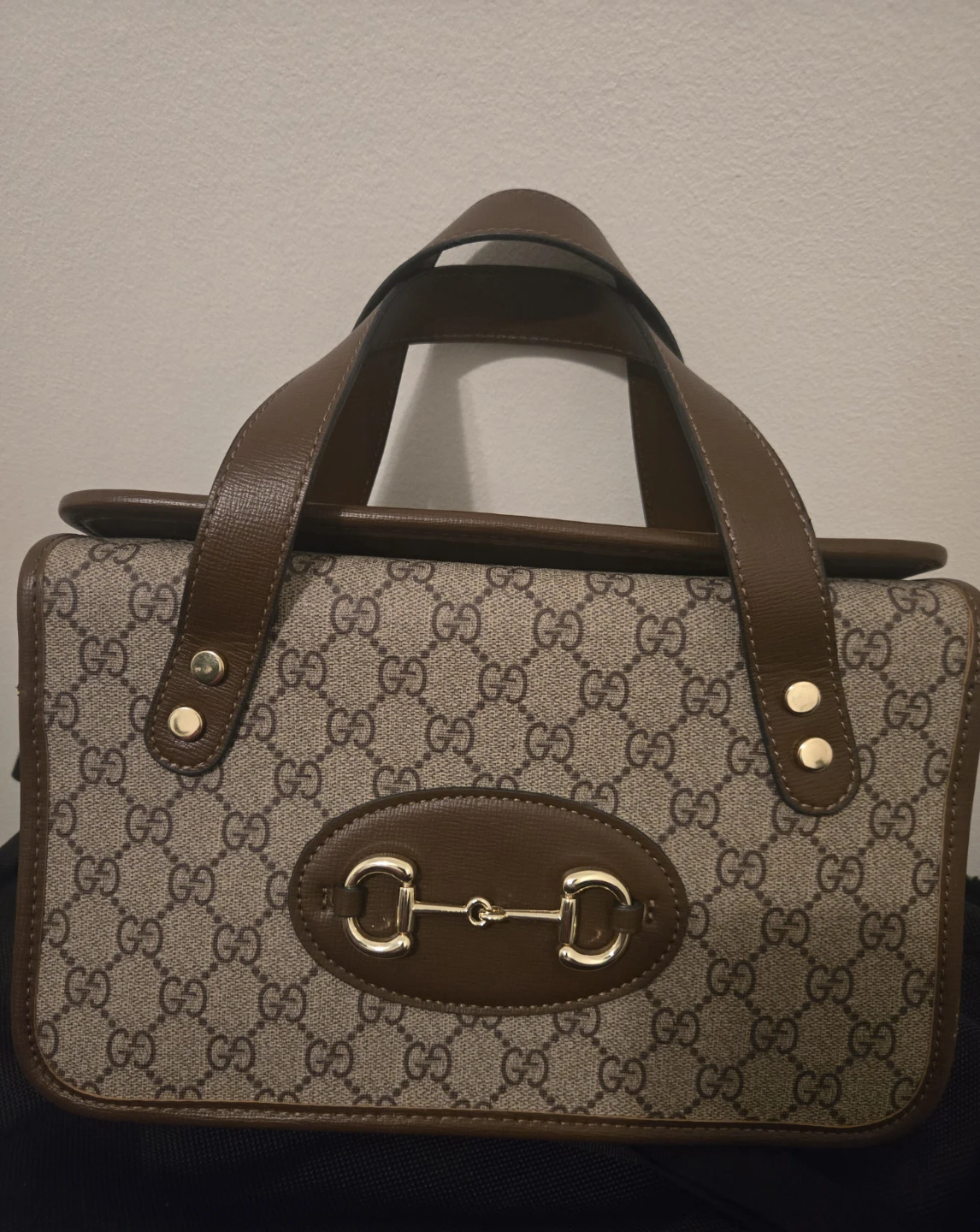 Designer top handle bag