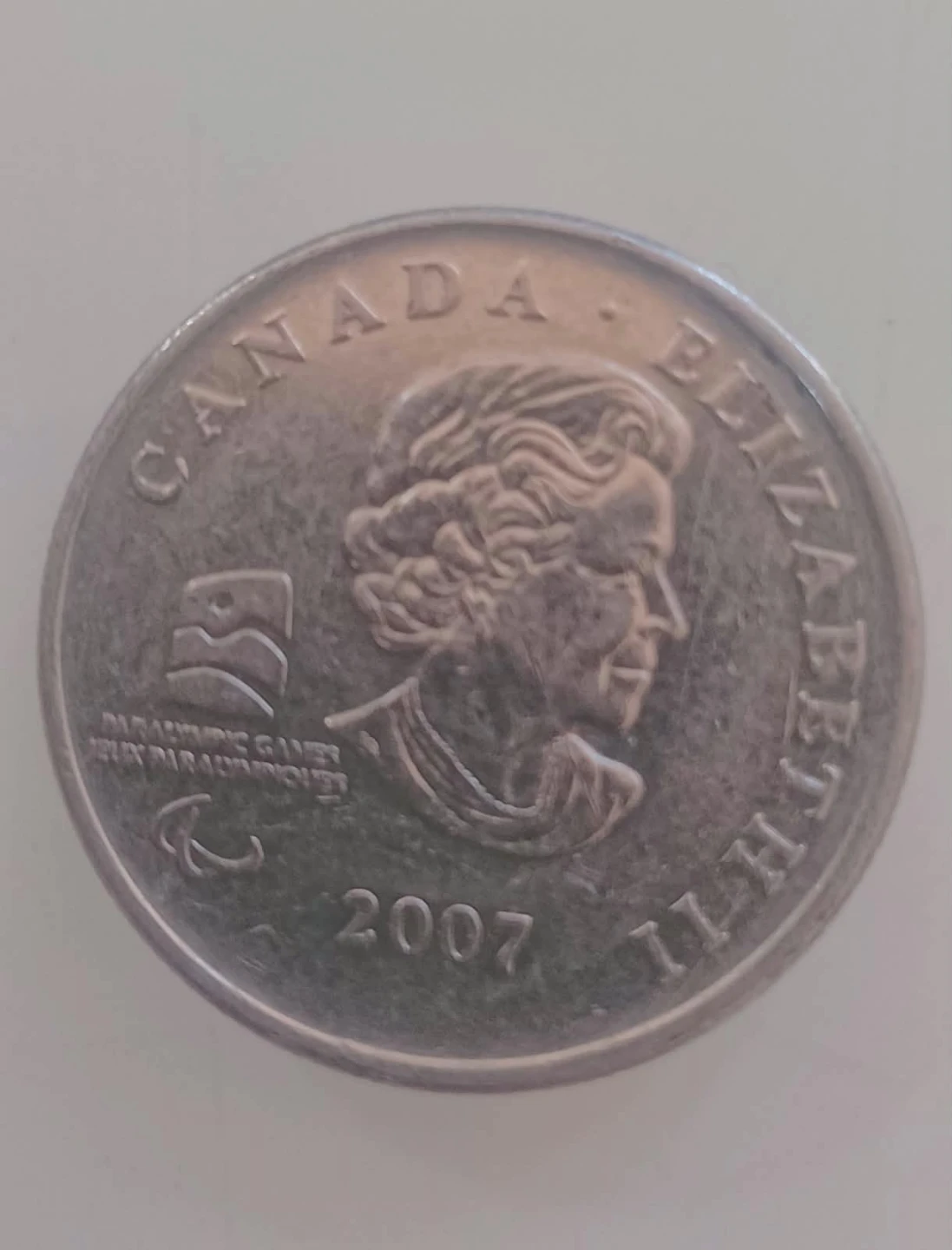 2010 Vancouver Paralympic 25 Cent Coin - photo 2
